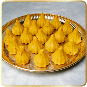 Kesar Modak – saffron-flavored modak with rich aroma by Gangdhar Mithaiwale – Ganesh Chaturthi special sweet