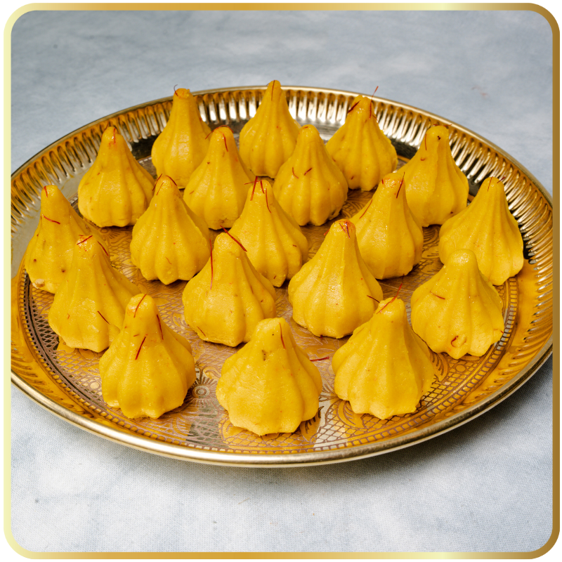 Kesar Modak – saffron-flavored modak with rich aroma by Gangdhar Mithaiwale – Ganesh Chaturthi special sweet