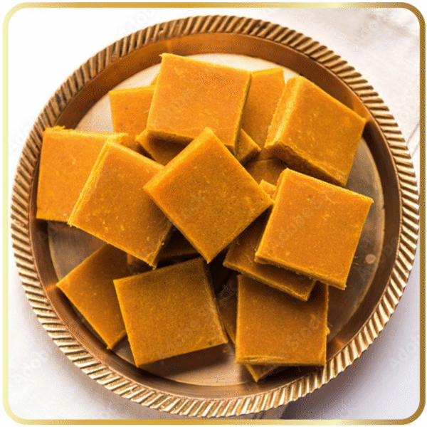 Amba Barfi – soft mango barfi in yellow-orange color by Gangdhar Mithaiwale