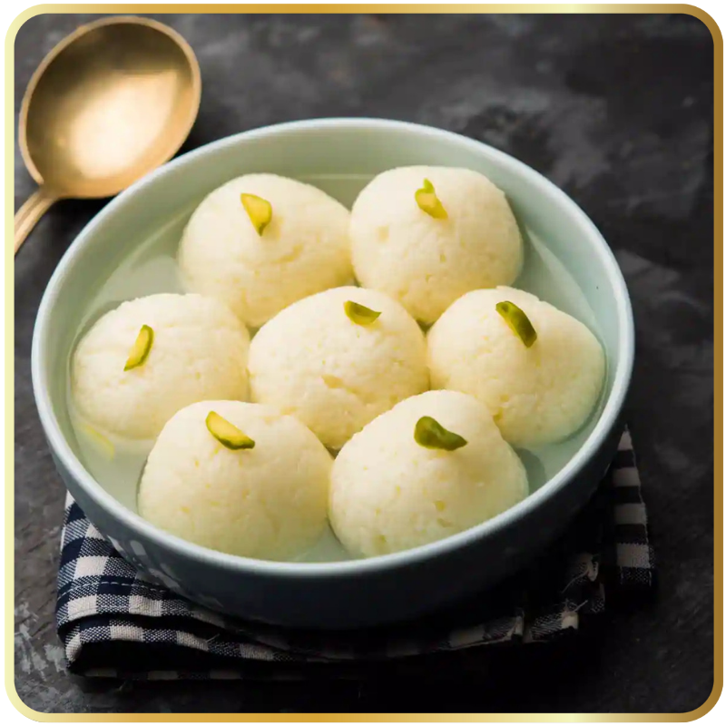 Rasgulla – Spongy white syrup-soaked Bengali sweet