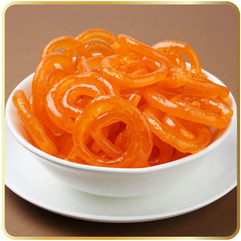 Golden crispy Jilebi soaked in sugar syrup by Gangdhar Mithaiwale