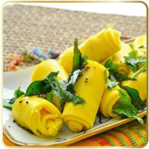 Authentic Maharashtrian Surali Wadi garnished with coconut and coriander